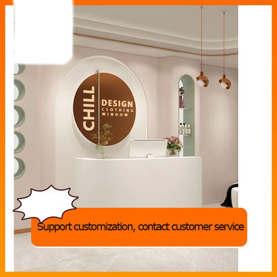 Un bureau de service de consultation courbe pour le salon d'ongles